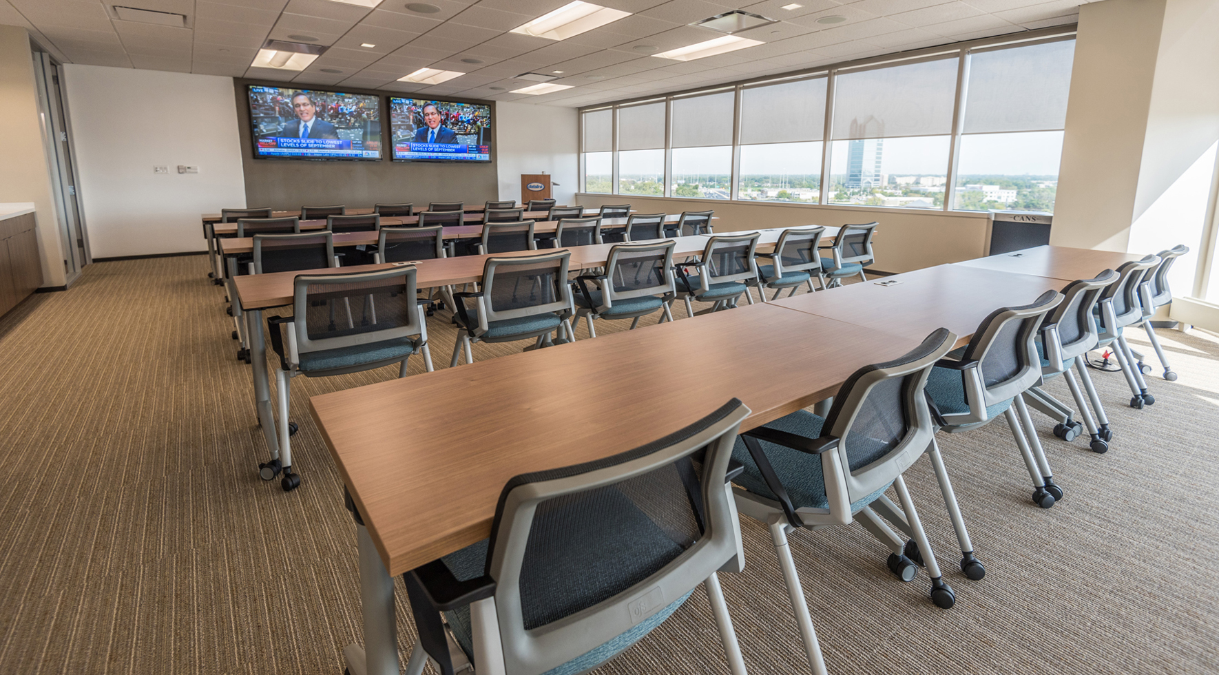 Tables, chairs, and technology for a training room