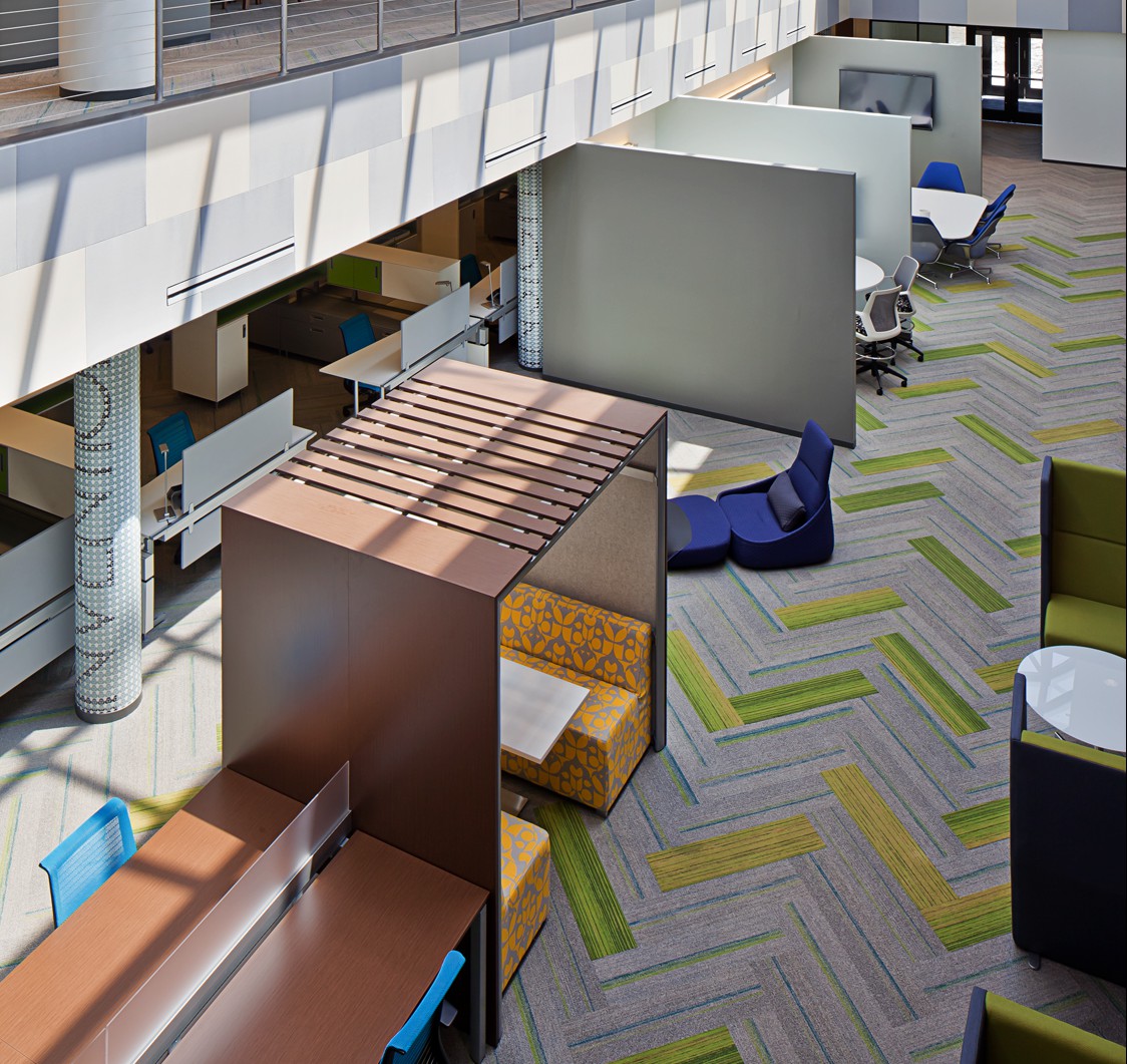 A lounge space featuring private and public spaces