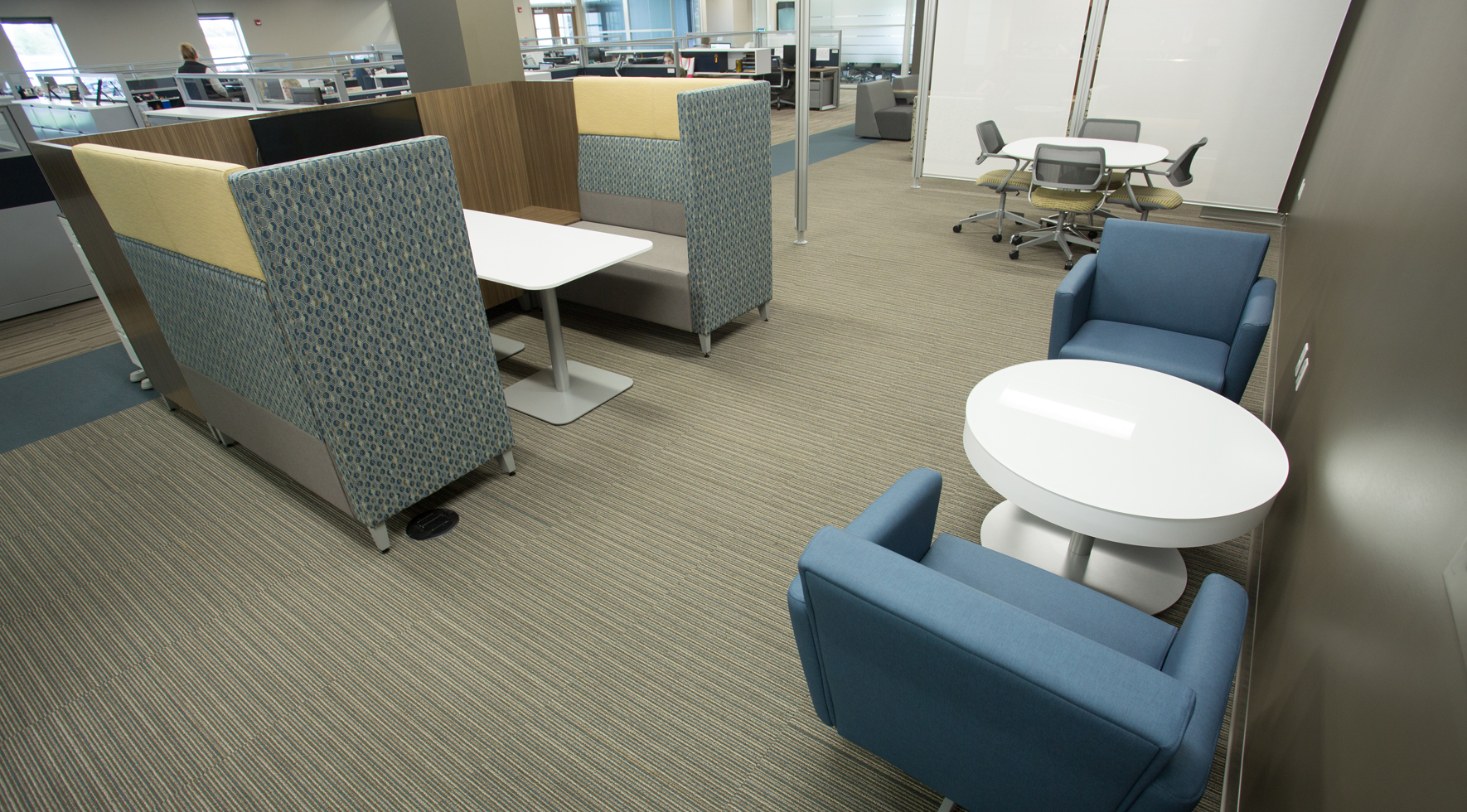 A cafe space created with booth seating