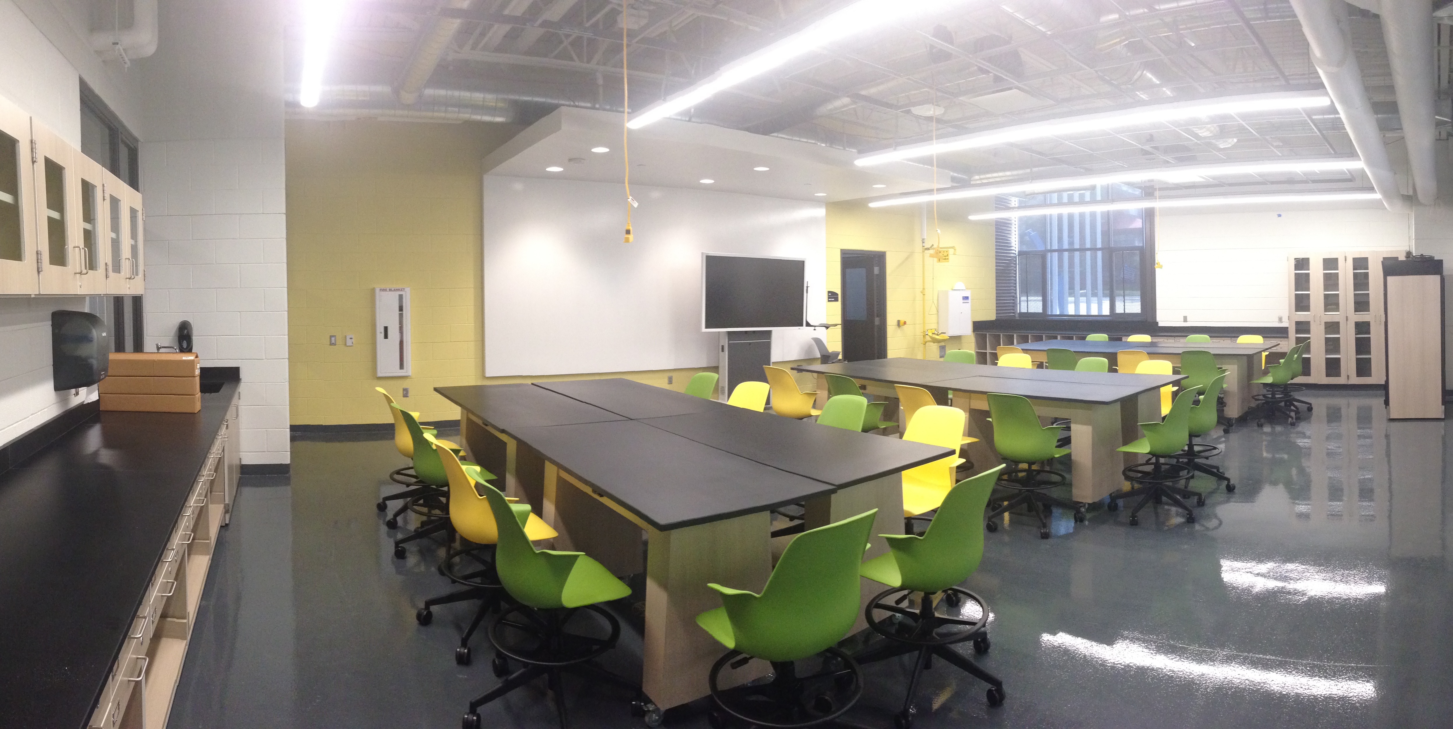 Lab tables with movable chairs in the classroom
